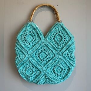 Handmade crocheted purse using cotton nylon yarn and hand stitched cotton lining